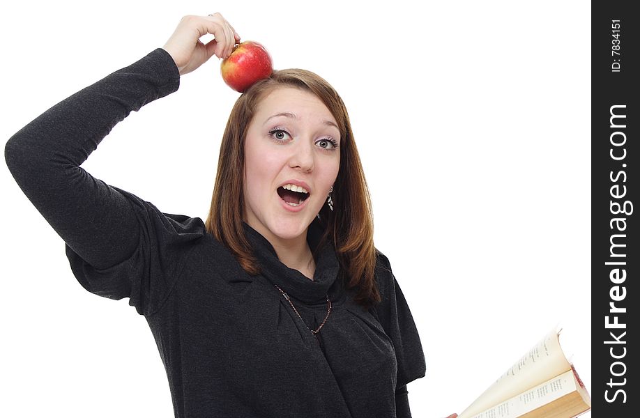 The girl with the book and a red apple on a white background. The girl with the book and a red apple on a white background