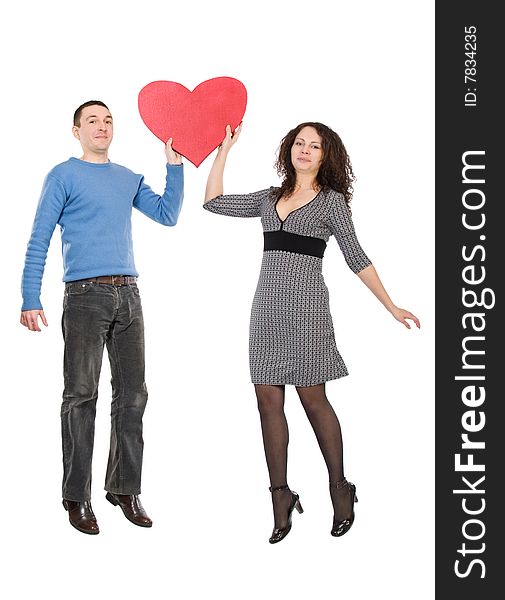 Happy jumping couple with heart isolated over white