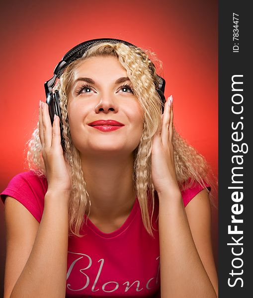 Blond woman listening to the music