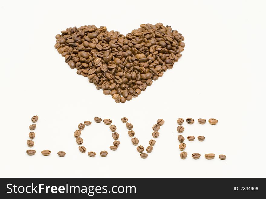 Sign and hearts shape made from coffee beans. Sign and hearts shape made from coffee beans
