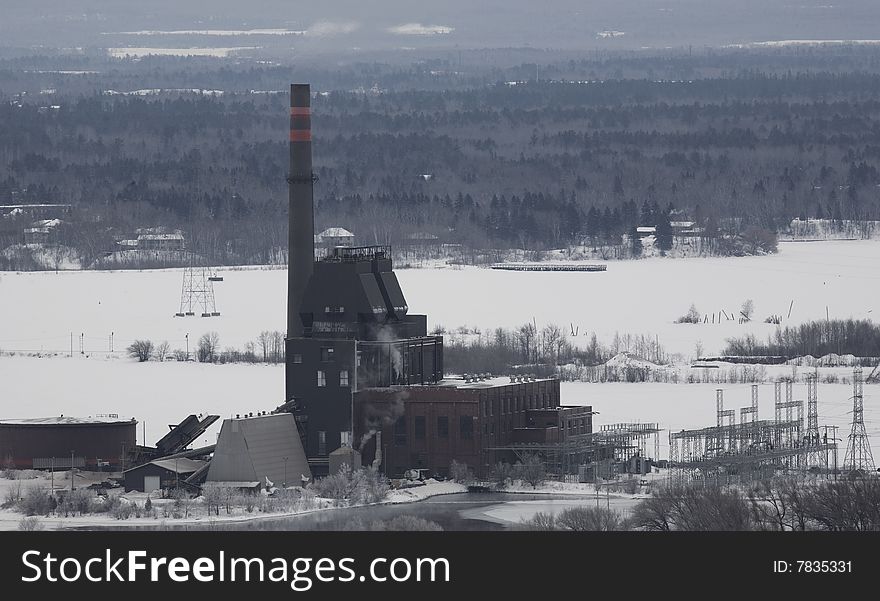 Winter power plant old and dirty in the north Woods of Minnesota