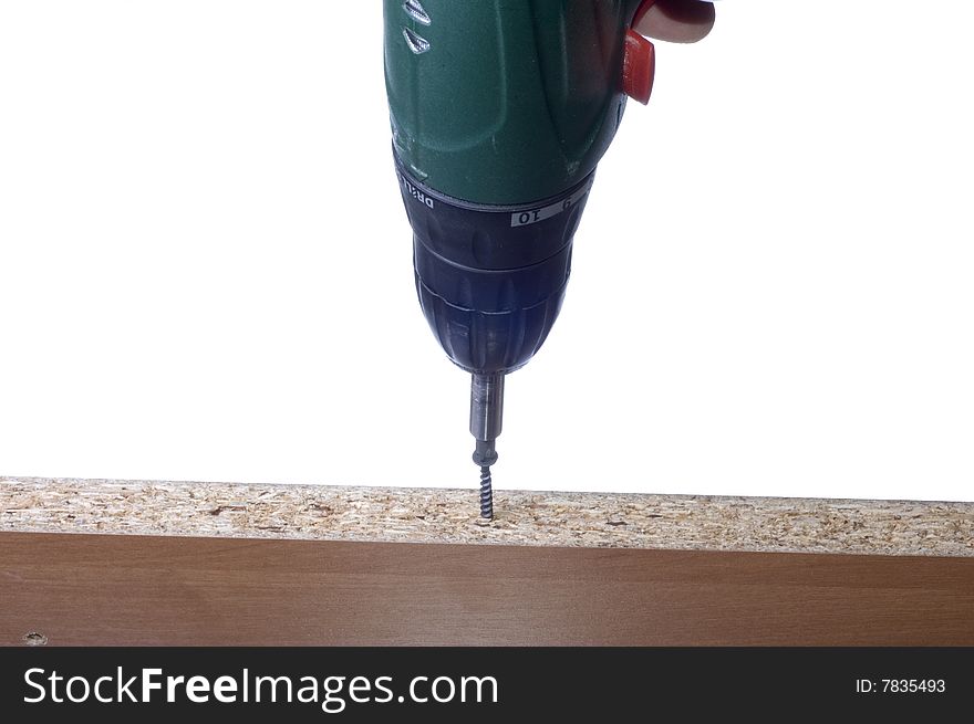 Green cordless drill on white background