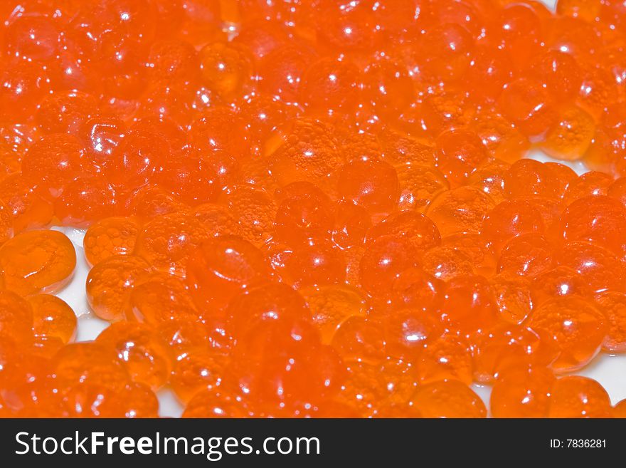 Red Caviar delicacy macro on a white background