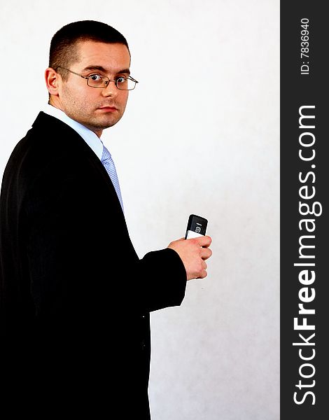 Young businessman on isolated background