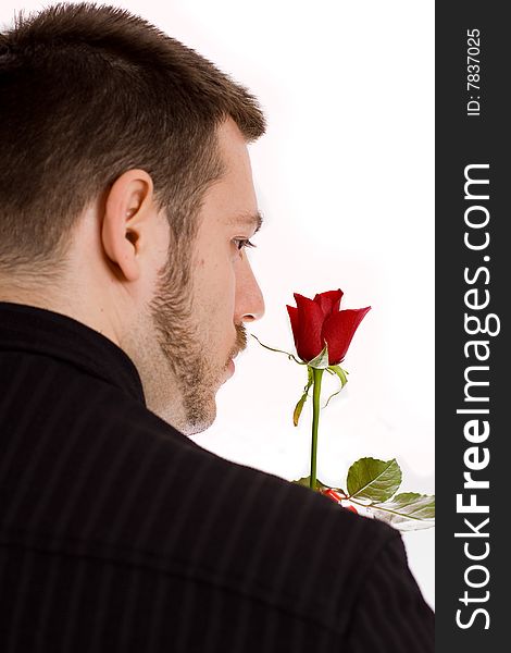 Man portrait holding a rose. Man portrait holding a rose