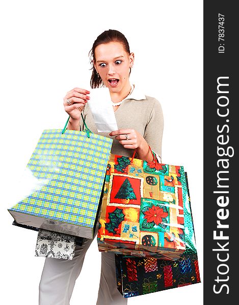 A young woman back from an shopping spree realized that she spend much to mach money in the stores. A young woman back from an shopping spree realized that she spend much to mach money in the stores.