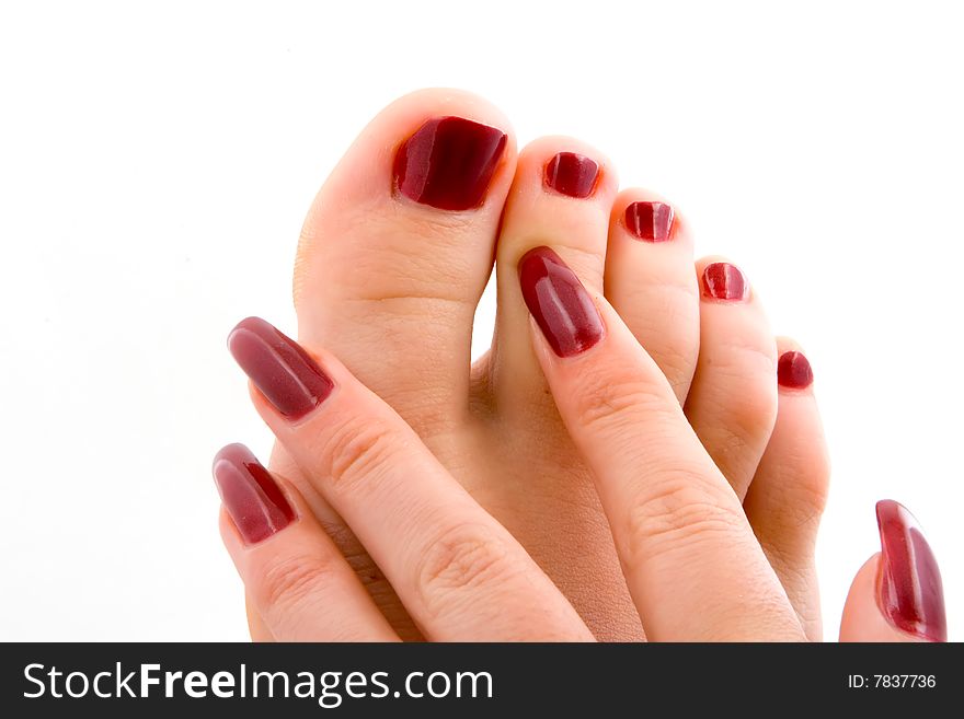 Woman feet massage isolated in white background