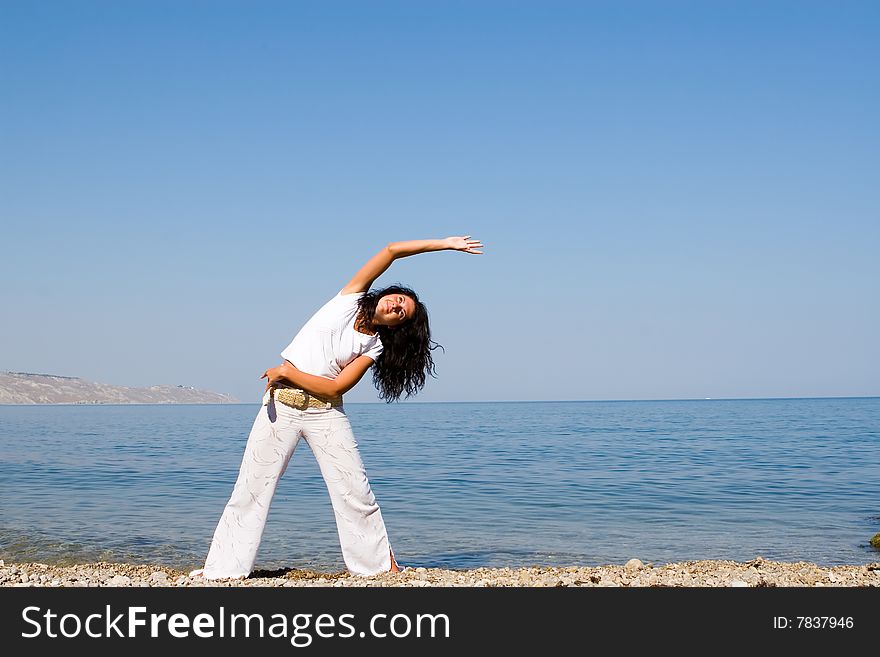 Fitness woman on the beach