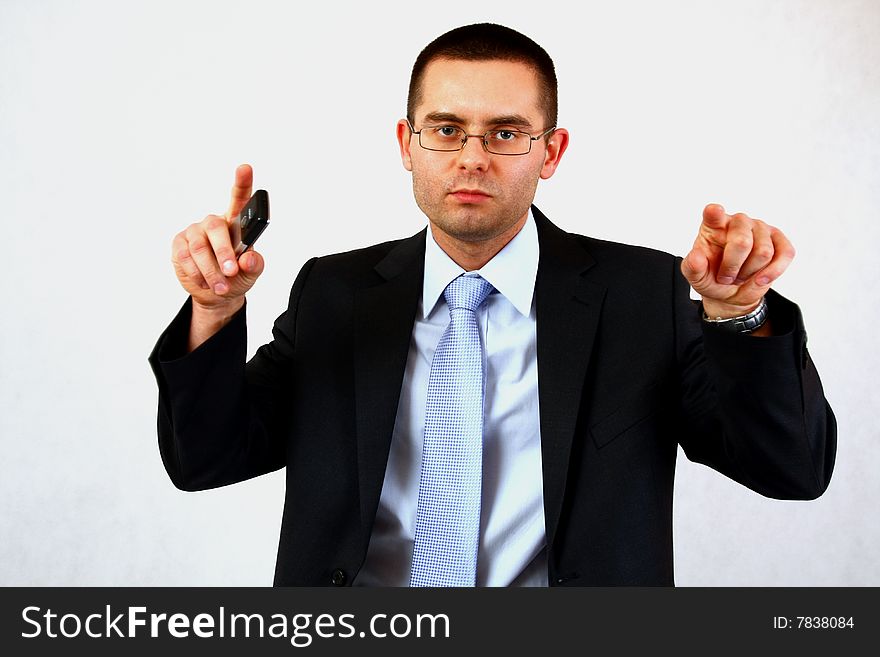 Young businessman on isolated background pointing with his fingers. Young businessman on isolated background pointing with his fingers