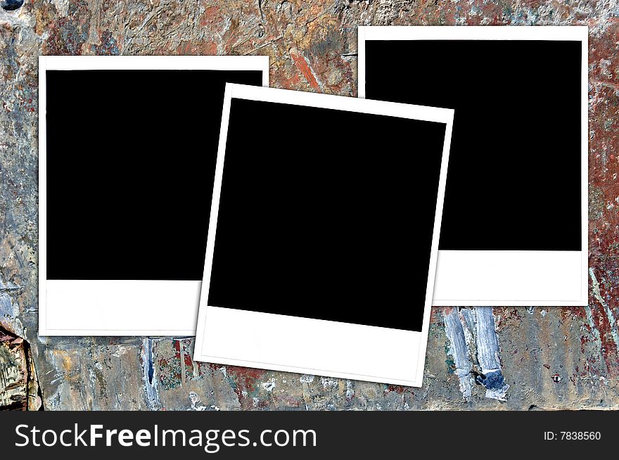 Instant photos on a grungy painted wood surface, blank for your image or text. Instant photos on a grungy painted wood surface, blank for your image or text.