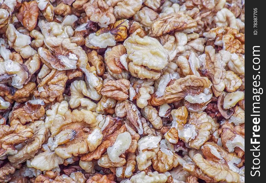 Delicious walnuts background in market