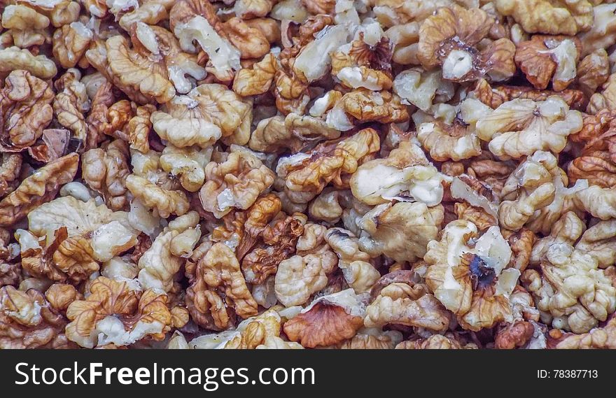 Delicious walnuts background in market