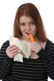 The Young Woman With Carrots And Cabbage Sheet Stock Image