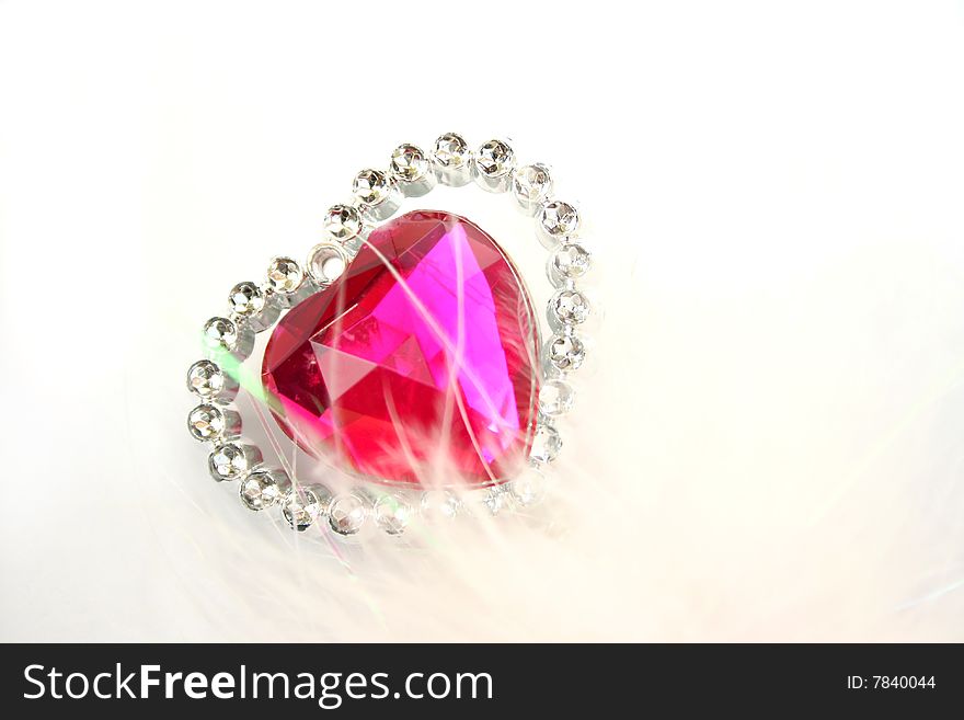 Red heart stone on white background. Red heart stone on white background.