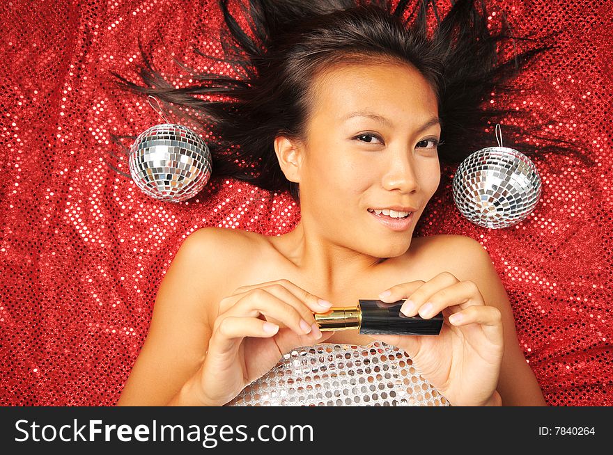 Asian Chinese Woman Preparing To Put On Make-up