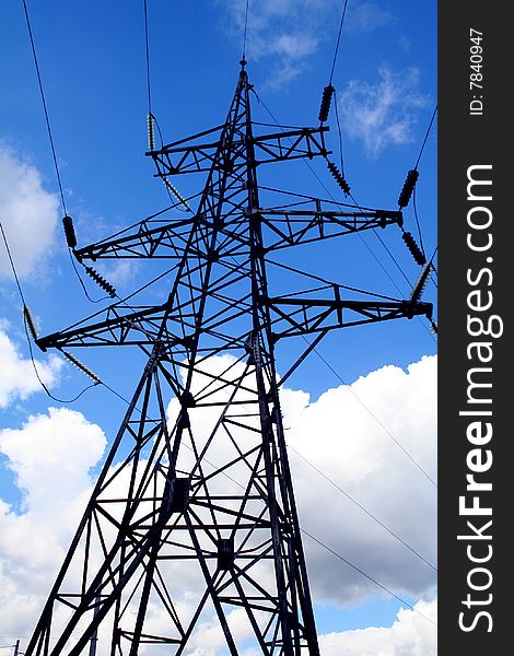 Electrical Tower On A Background Of The Blue Sky