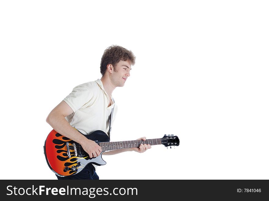 Young man playing guitar isolated over white. Young man playing guitar isolated over white