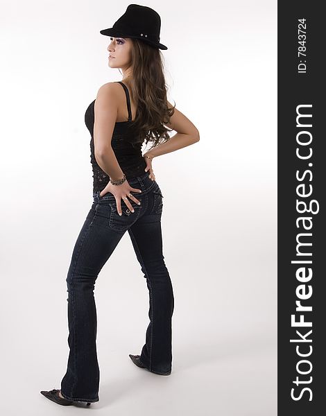 Photo of a female fashion model posing in jeans. Photo of a female fashion model posing in jeans
