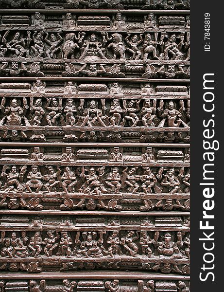 Wooden Hindu relief with dancing woman figure