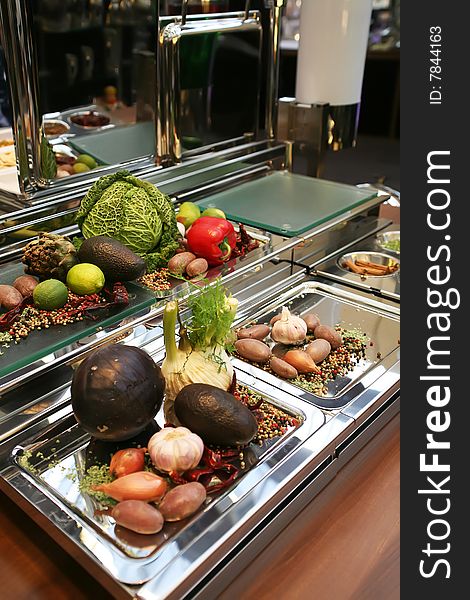 Different raw vegetables on reception table. Different raw vegetables on reception table