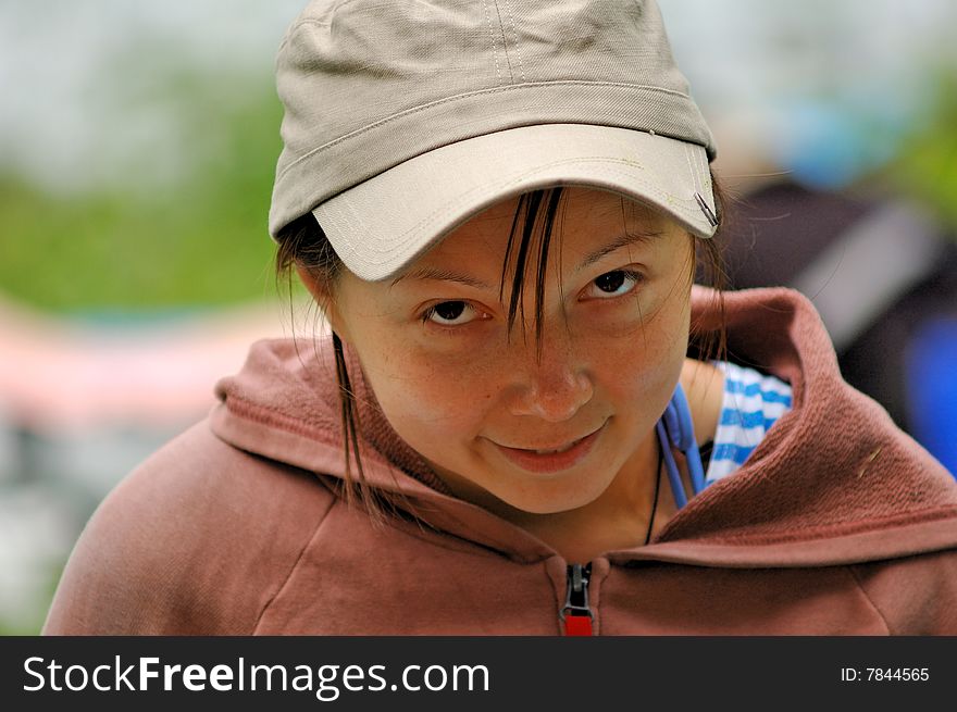 Portrait of a girl with cunning expression