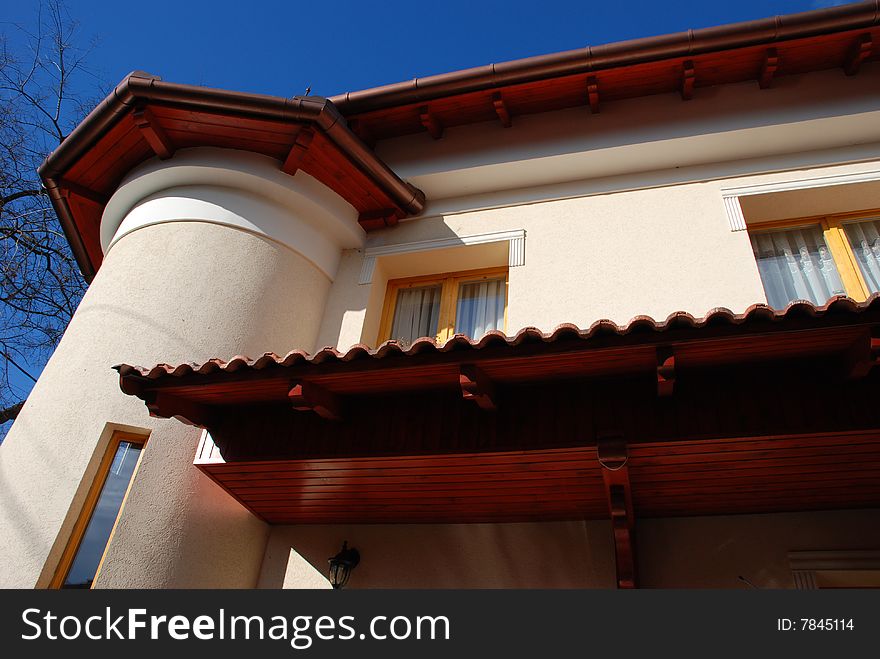 Mediterranean-style new home with blue sky