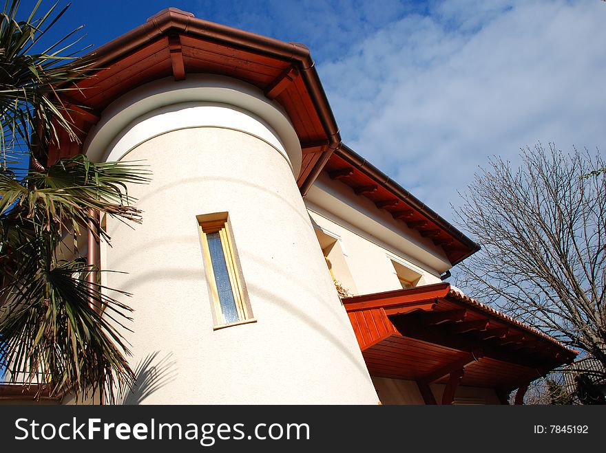 Mediterranean-style new home with blue sky