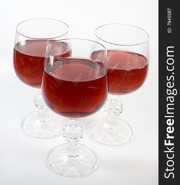 Three crystal wine-glassful with red wine
