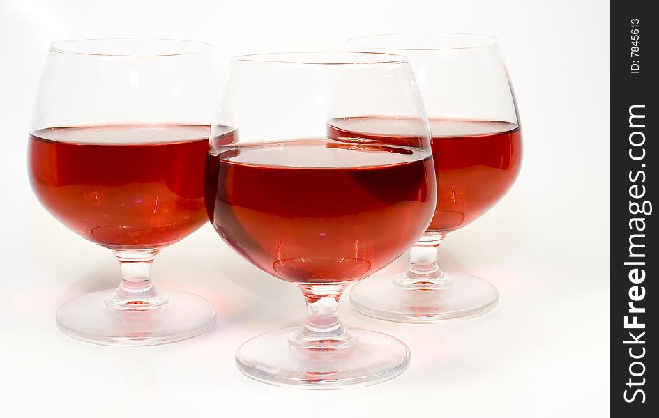 Three crystal wine-glassful with red wine