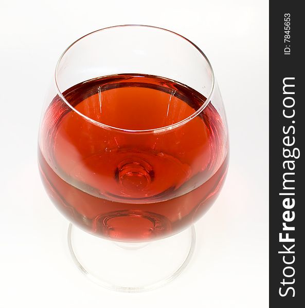 One crystal wine-glassful with red wine