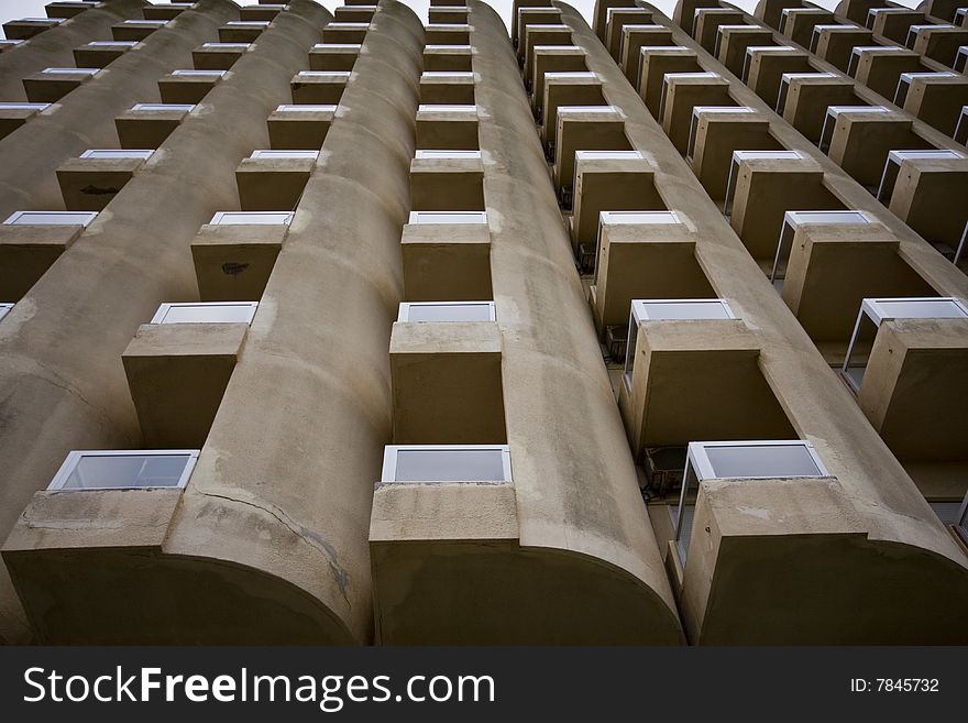 Windows and balconies of a hotel lonely in winter. Windows and balconies of a hotel lonely in winter