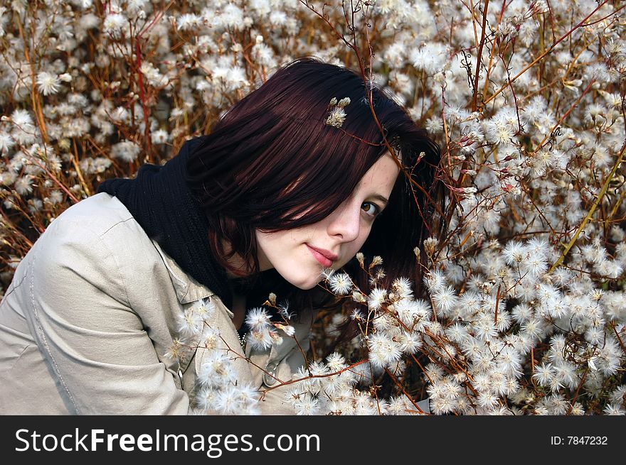 Dandelion and smiling girl in view