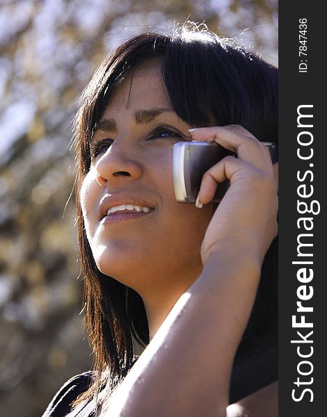 Hispanic Woman On Cell Phone