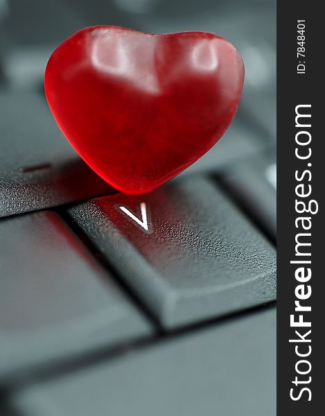 Valentine heart on black laptop keyboard. Valentine heart on black laptop keyboard