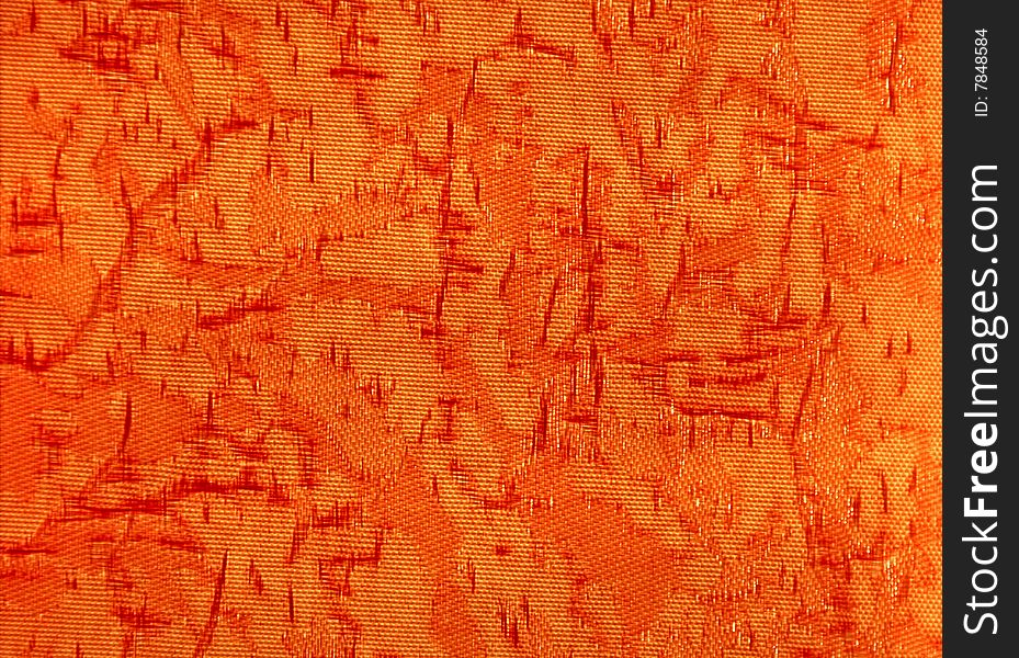 Uneven orange fabric - texture. illuminating from beneath behind an object