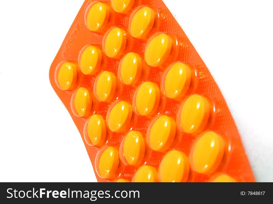 Some pills, capsules in package isolated on white. Bright, and clear.