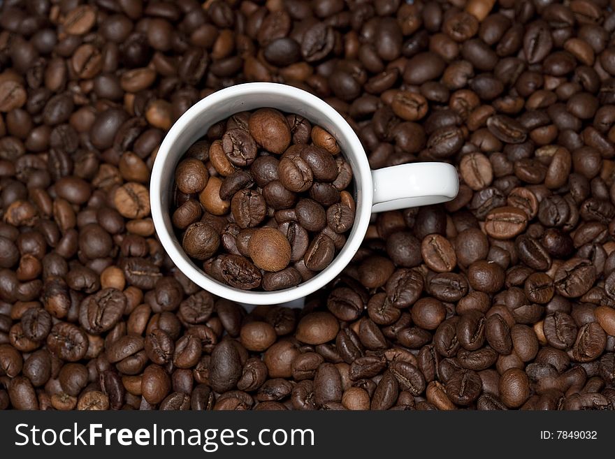 Background With White Cup And Coffee Beans