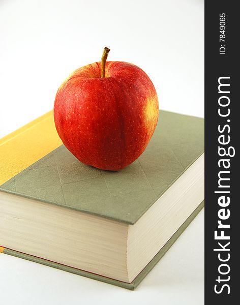 Red apple on a book