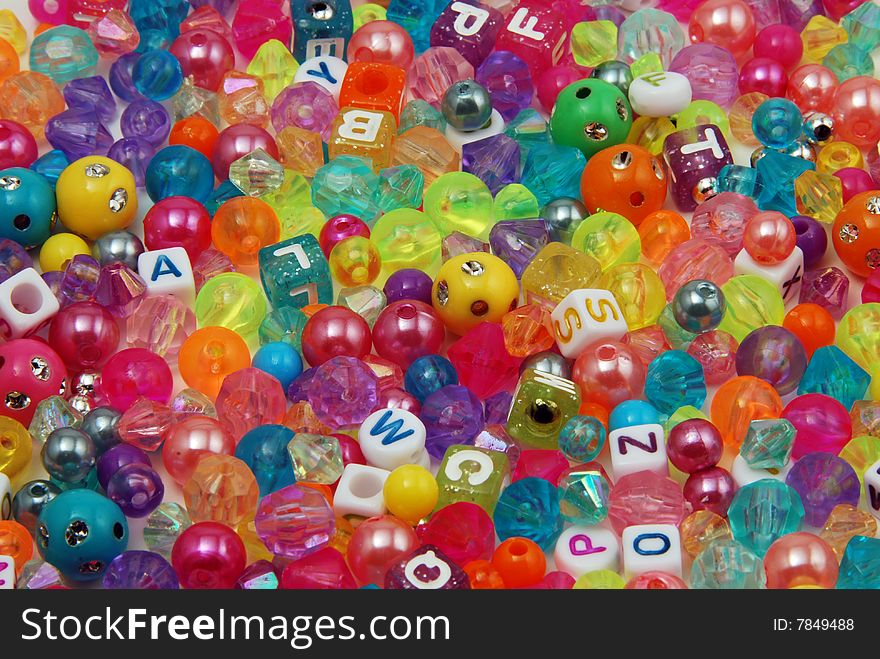 Small colorful beads scattered around