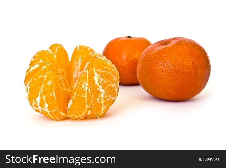 Sweet ripe tangerines on white background