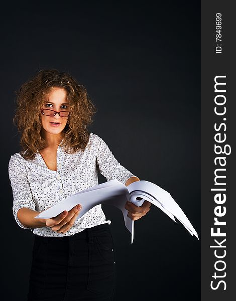 Business women with documents on black background. Business women with documents on black background