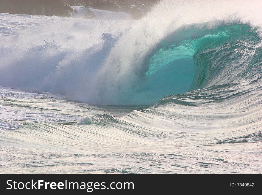 The explosive and beautiful waimea shore break in Oahu's north shore.