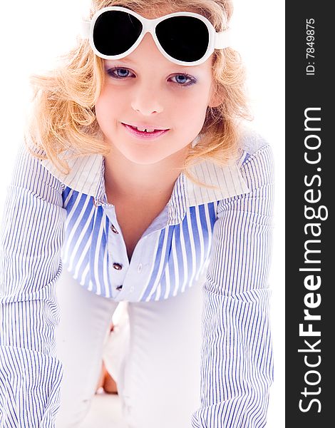 A blue fashion child showing her clothes on white. A blue fashion child showing her clothes on white