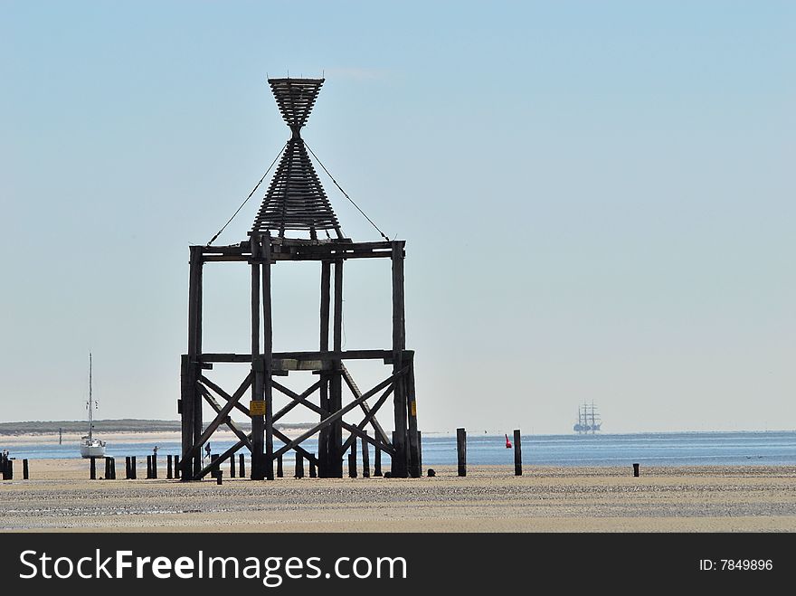 This ist the nautic sign for the island Wangerooge. It's like a lighthouse for daytime. Its specific shape shows the sailors which island they see. This ist the nautic sign for the island Wangerooge. It's like a lighthouse for daytime. Its specific shape shows the sailors which island they see