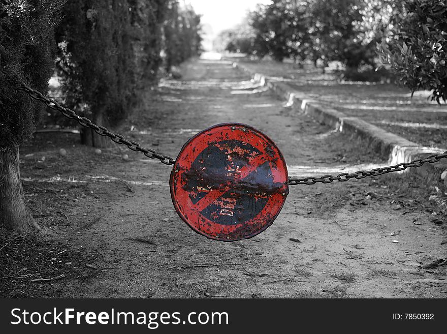 Do not pass, do not parking, chain crossing way. aged weathered signal, Spain