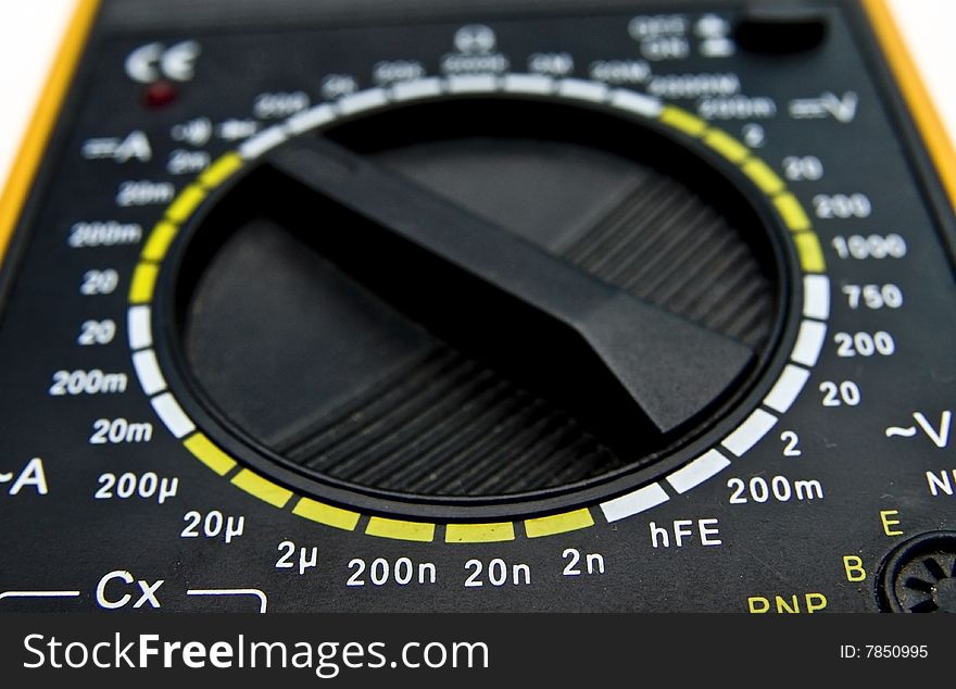 Digital multimeter black dial with yellow and white bars. Digital multimeter black dial with yellow and white bars.