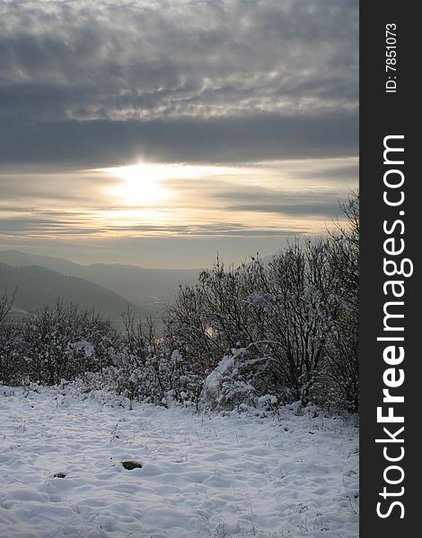 French mountainous landscape in winter, at sunset. French mountainous landscape in winter, at sunset.