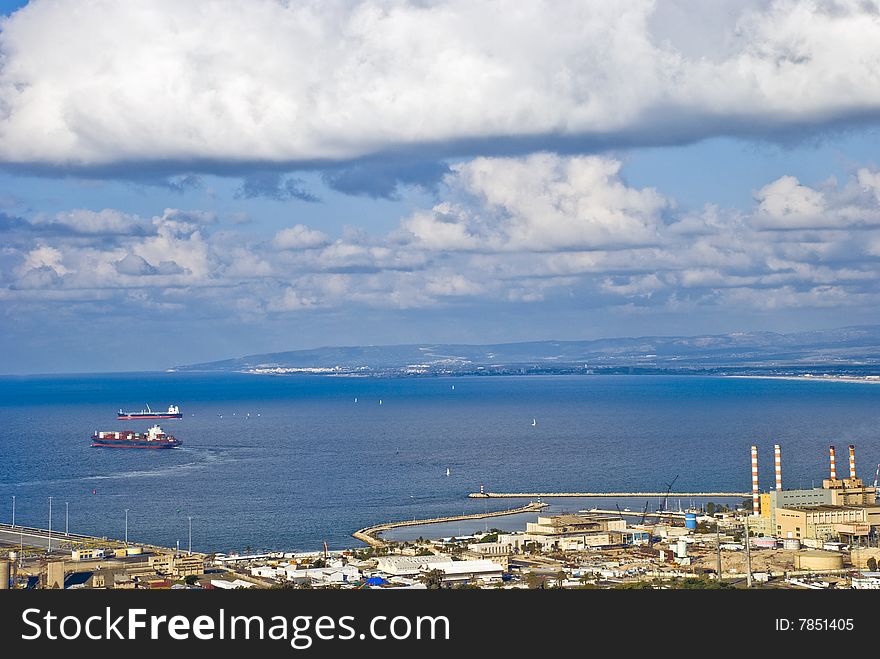 Beautiful landscape of a bay with ships sailing far away.