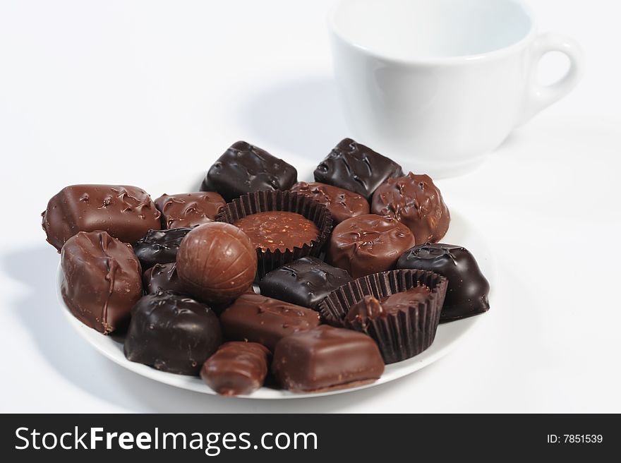 Assorted chocolates isolated on white