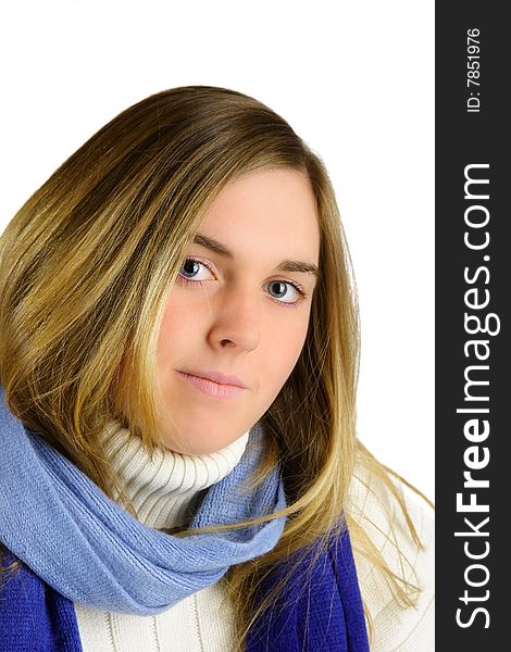 Attractive young blond woman with white turtleneck sweater and blue scarf. Attractive young blond woman with white turtleneck sweater and blue scarf.